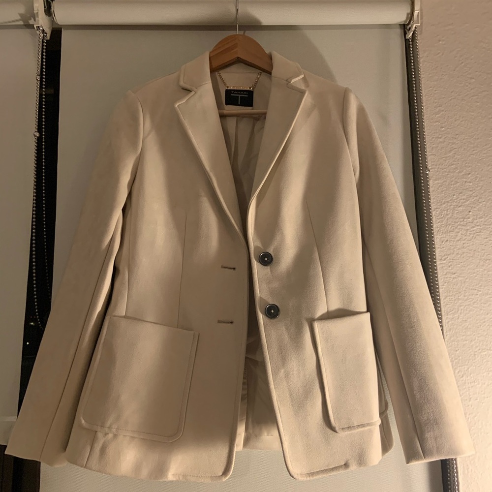 Delicate, soft, and sophisticated tan/nude blazer.